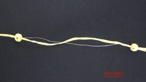 Bild von Girlande 10m/ 15mm, Organza/Holzperlen, gelb