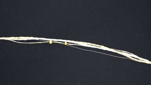 Bild von Girlande 10m/ 5mm, 3x Schnur/-Holzperlen, gelb