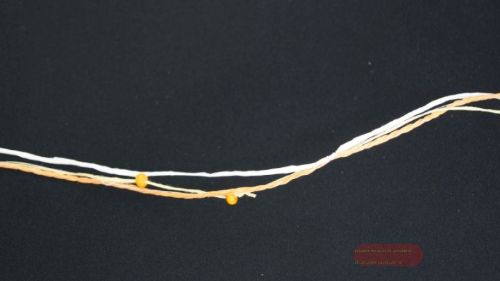 Bild von Girlande 10m/ 5mm, 3x Schnur/-Holzperlen, orange/gelb