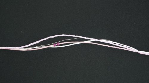 Bild von Girlande 10m/ 5mm, 3x Schnur/-Holzperlen, flieder