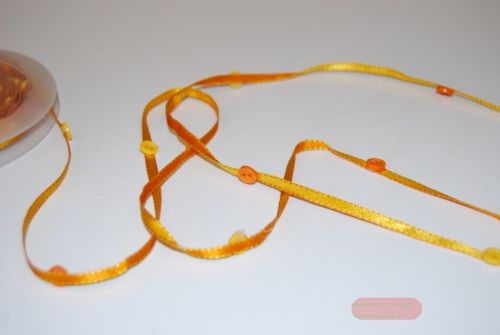 Bild von Band 10m/ 4mm, Knopf an Band, gelb