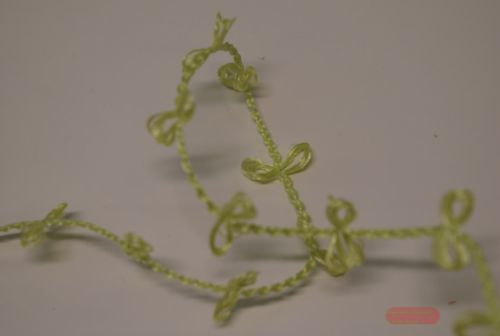 Bild von Band 25m/ 13mm, Schleife an Faden, grün